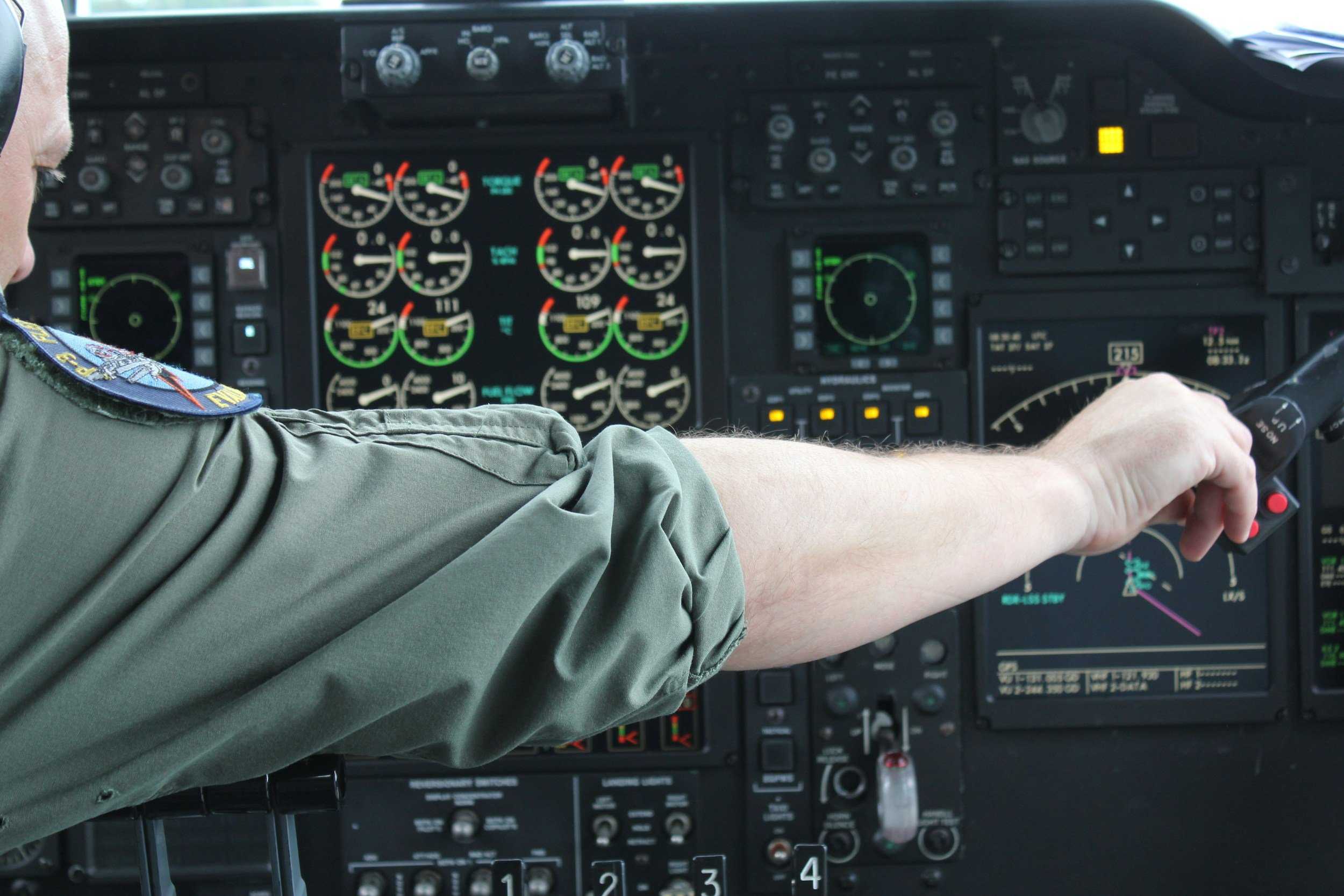 An airplane pilot dashboard, complete with many dials displays that read out information about the plane.
